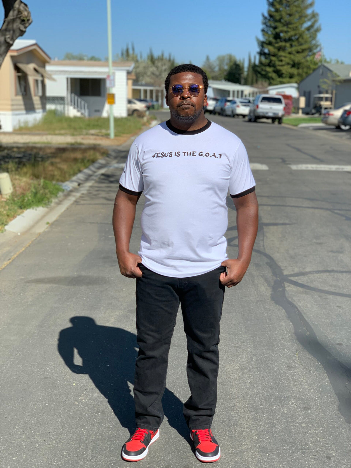 JESUS IS THE G.O.A.T Ringer Tee